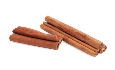 Dry aromatic cinnamon sticks isolated on white