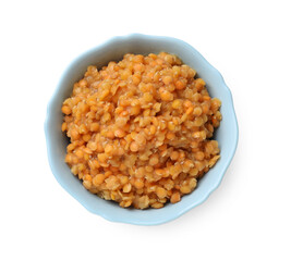 Delicious red lentils in bowl isolated on white, top view