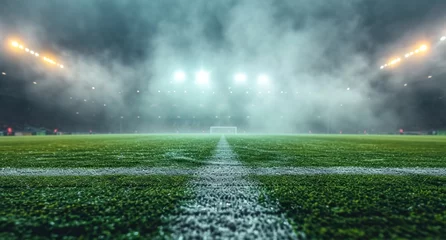 Fotobehang soccer field with a green pitch, in the style of smokey background © olegganko