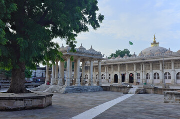 Fototapeta na wymiar Pallion with stone columns or pillars in Indo-sarasenic Islamic style architecture at Sarkhjez Roza, Ahmedabad, India