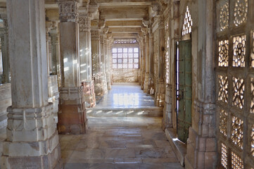 Stone Jali or Jaali with columns reflecting sunlight at Sarkhjez Roza, Ahmedabad, India