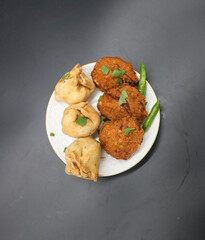 Samosa or singara,traditional fried or baked food isolated on black background