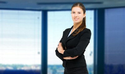 Confident businesswoman in modern office setting