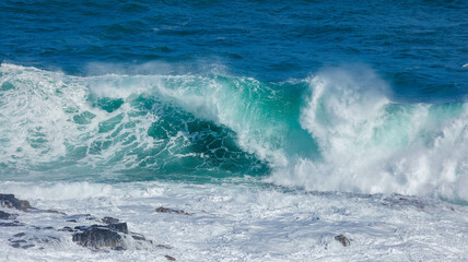 High waves crashing ashore in Hawaii