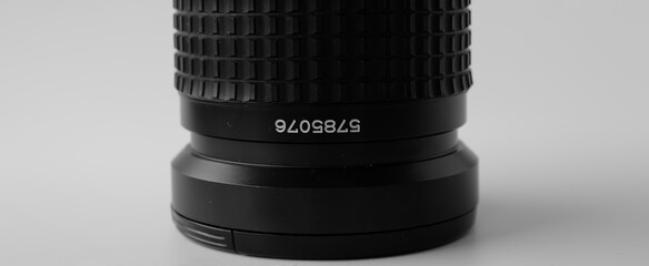 The serial number on the old lens. Marking of photo lenses.