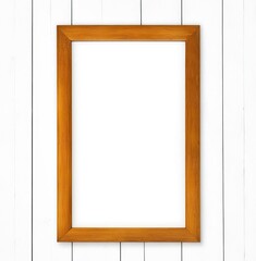 Mockup. A wooden frame with free space hangs on a white wall.