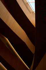 Design of the central public library in Calgary. Modern art interior design with wooden walls and glass ceiling.