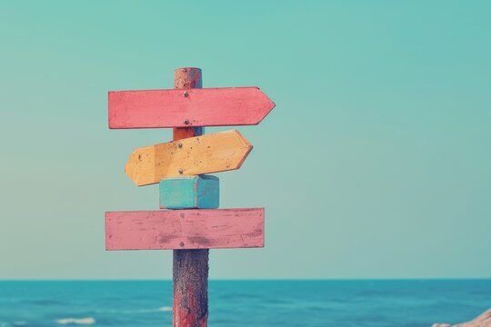 an arrow on a post pointing to different destinations