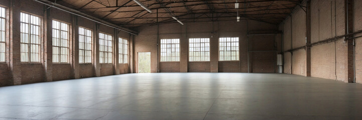 Interior of a modern warehouse storage of retail shop with pallet truck near shelves