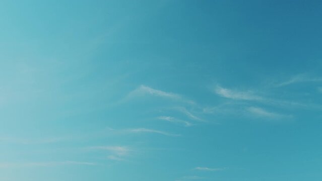 Sky after the storm. Majestic amazing blue sky with cirrus clouds. Nature clouds moving.