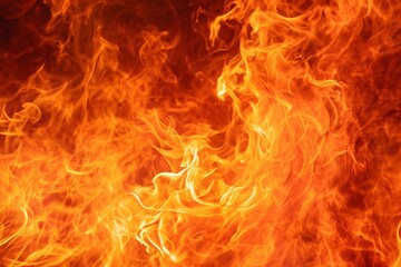 Fototapeta premium Fiery Minimalism: Orange and Red Flames on a Black Background