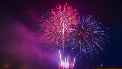 Fototapeta na wymiar colorful festive fireworks in the night sky