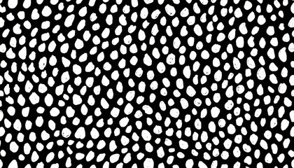 seamless hand drawn small dense polkadot animal spots pattern in white on black background abstract aboriginal dot art motif or organic cellular texture in a trendy doodle line art or linocut style