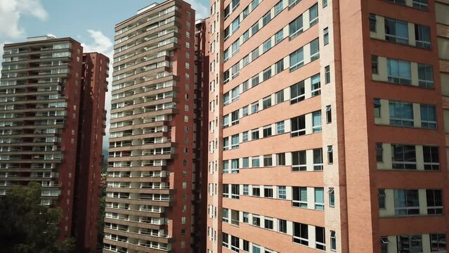 Aerial footage of Residential apartments in Medellin. Three skyscrapers in Medellin, Colombia. 4K footage.