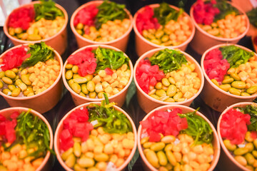 Vibrant poke bowls with fresh tuna, seaweed, and vegetable toppings.