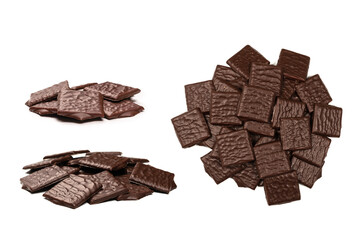 Dark chocolate candies isolated on white background.