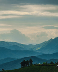 landscape panorama view beautiful scenery looking rice field fog green tree forest Mountain hill natural blue sky cloud horizontal distant countryside thailand asia travel holiday wind relax dawn time