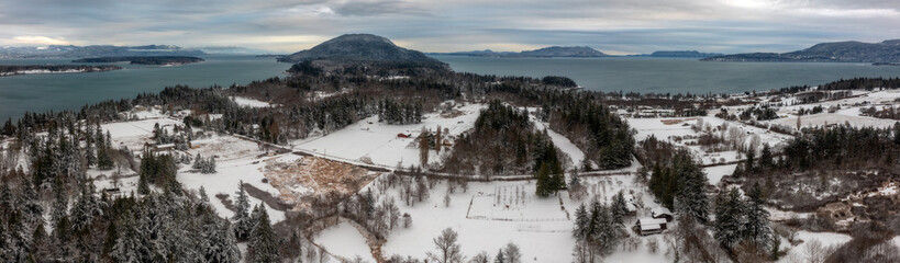 Aerial view of snowfall on Lummi Island in the Salish Sea area of Washington state. Although infrequent, snow can make for a beautiful landscape on this island in the San Juan Island archipelago.