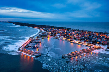 Frozen port in Kuźnica by the Baltic Sea at dusk, Hel Peninsula. Poland