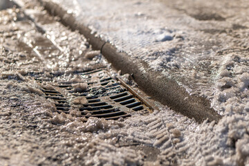 icy gully cover with footpath in winter