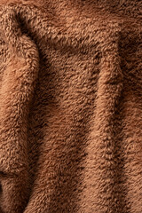 Texture of a brown faux fur as a background.