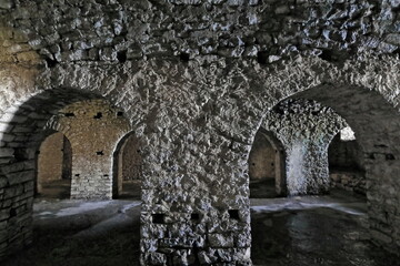 Stone arches on the ground floor, former prison inside the Ali Pasha of Tepelene castle, Porto...