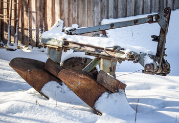 Old agricultural equipment. The problem of small, poor farms