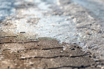 an icy stone footpath in winter