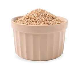 Dry wheat groats in bowl isolated on white