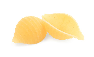 Raw conchiglie pasta isolated on white. Italian cuisine