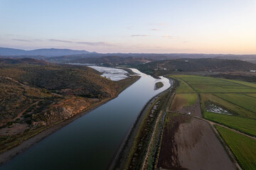 Watershed of the Odejouca and Arade rivers in South Portugal, connection of these rivers, view of the mountains and Portimao on the Atlantic Ocean