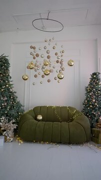 The photo studio is decorated with New Year's shining decorations