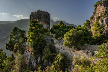 Ruins Of Ancient Tower In Green Mountains