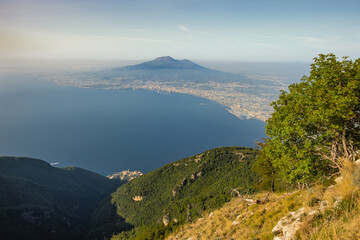 The view of Vesuvius volcano and the Gulf of Naples from the high angle of Mount Faito 