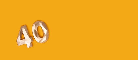 Banner with golden number 40 on a yellow background. Place for text.