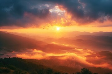 Naklejka premium Misty mountains in the warm glow of a golden dawn