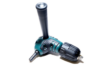 Right angle drill attachment. Selective focus. White background.