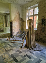 Views of a ghost statue in an abandoned building by the bed