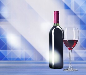 Bottle and glass of tasty alcohol red wine