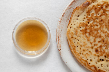 Homemade pancake and maple syrup