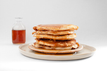 Homemade pancake and maple syrup