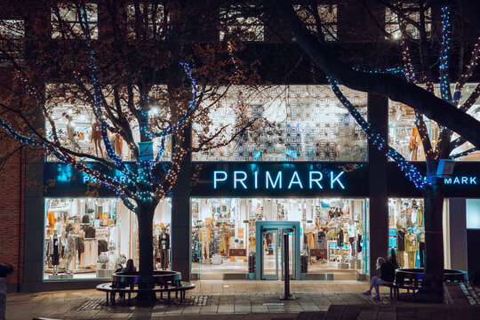 Christmas shopping, Primark clothing store lit up with Christmas lights