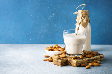 Non dairy milk, almond milk, vegan product. - obrazy, fototapety, plakaty