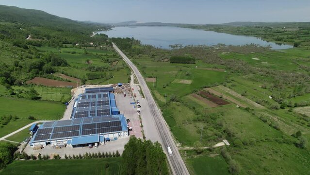 Environmentally friendly factory with solar energy panels installed on its roof, aerial view. Ladik Samsun Turkey