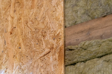 Constructing Diverse Wall Sections: One Half with OSB Plate, the Other with Mineral Wool.