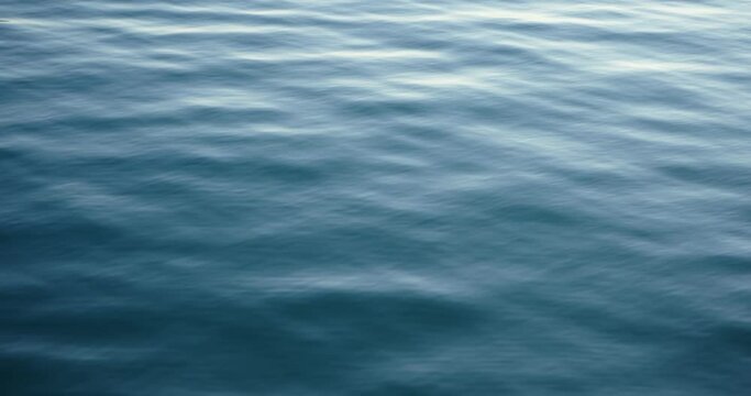 Waves in blue pure sea moving in slow motion. Concept of ecology