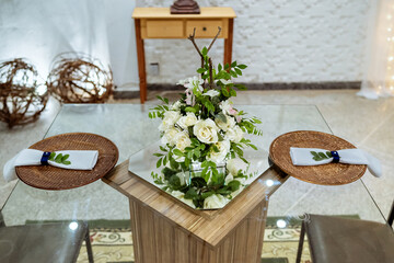 white wall with a wooden frame and flower decorations