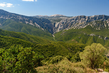 Panoramic view of the Supramonte in inner Sardinia with the entrance of the canyon of Gorropu in the background