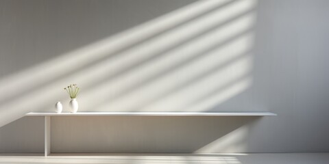 a room in an office with sunlight and shadows behind a wall, in the style of light white and white, minimalistic abstractions, bokeh panorama, playing with light and shadow