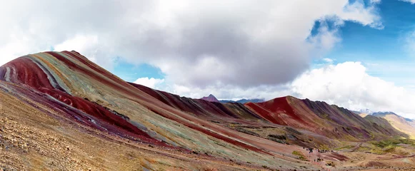 Papier Peint photo autocollant Vinicunca Hiking trail towards Vinicunca in Cusco, Peru with an elevation of over 17,000 ft.  The landscape is known as Rainbow Mountain or Montana de Siete Colores.